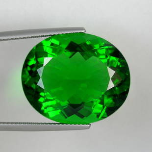 Natural Amethyst 11.89 Carats - VVS: Dimension:- 17.6 x 14 x 9.6 MM;Color :-Green; Weight:-11.89 Carats.; Clarity:-VVS ;Shape/Cut:-Oval; irradiation treatment