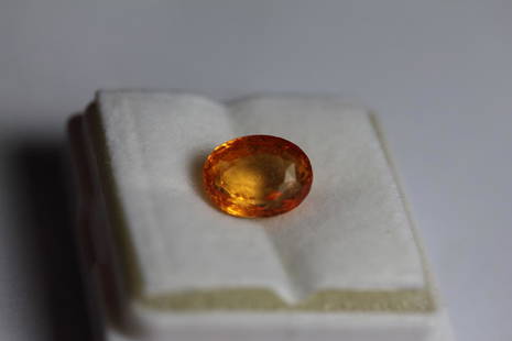 Natural Orange Sapphire 3.47 carats: Natural Orange Sapphire 3.47 carats......100% natural earth mined.....very good luster fire.......origin- Ceylon