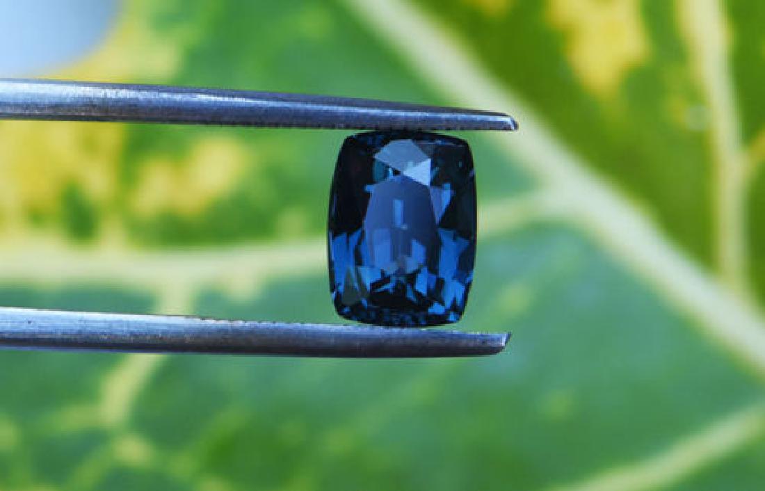 Natural Cushion Blue Spinel 2.74 Cts - VVS: Natural Cushion Blue Spinel 2.74 Cts.....DIMENSIONS : 8.84 X 6.72 X 5.15 mm;TREATMENT : UNHEATED;ORIGIN : SRI LANKA (CEYLON);CERTIFICATE : CGJ SRI LANKA......