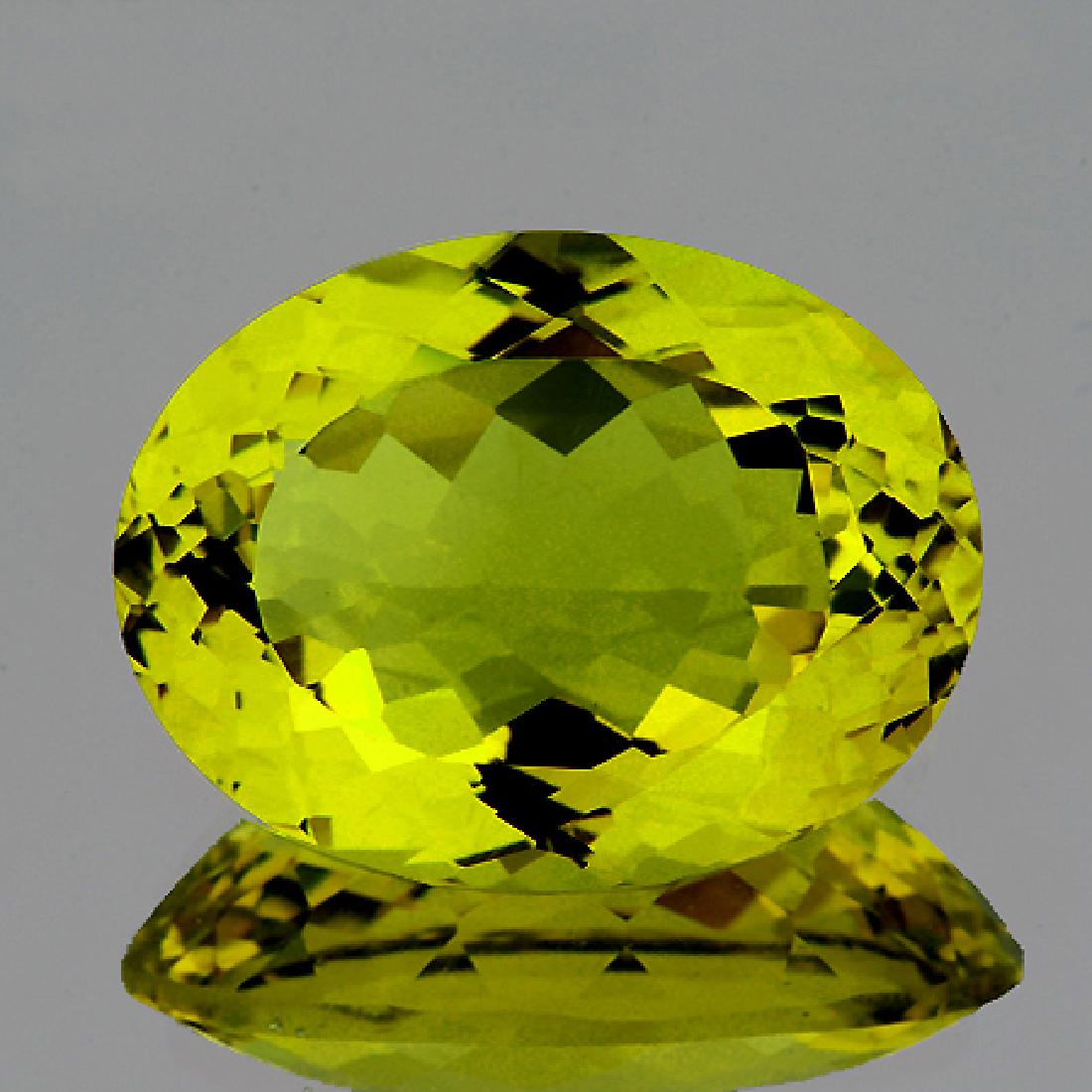 Natural Green Gold Lemon Quartz 51.05 Cts - VVS: Natural Lemon Quartz; WEIGHT : 51.05 cts; SHAPE : Oval ; SIZE ( L x W x D ) : 31.00 x 23.50 x 12.92 mm; QUANTITY : 1 pieces ; COLOR : Green Gold AAA COLOR; CLARITY : Flawless-VVS1; ORIGIN : Brazil; HA