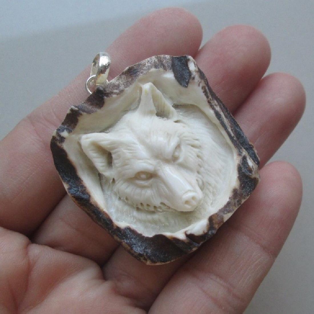 Hand Carved Antler Wolf Pendant (1 of 1)