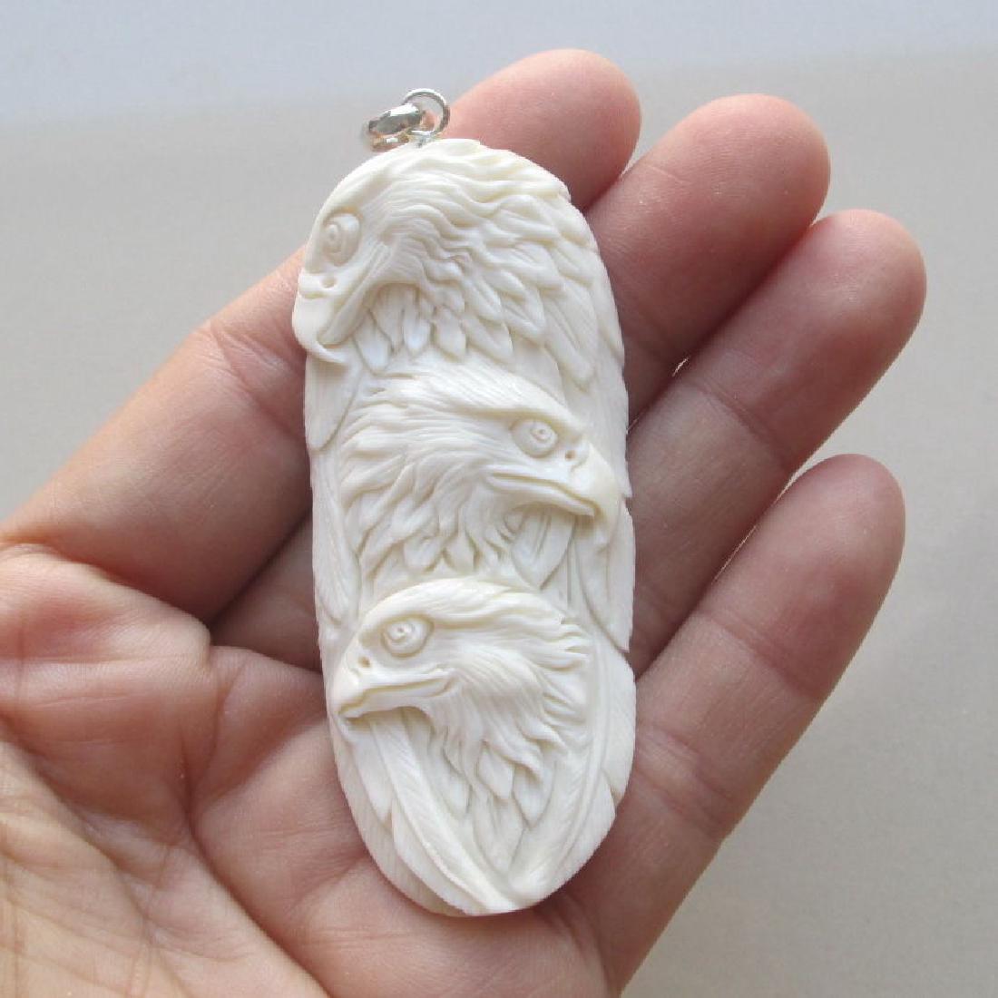 Hand Carved Eagle Family Pendant (1 of 1)