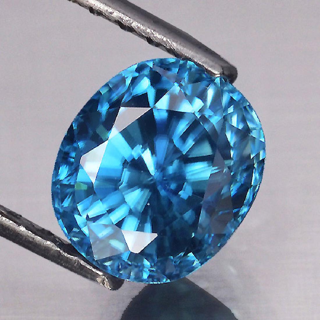 Top AAA Electric Blue Zircon 2.84 Cts {Flawless-VVS1}: Natural Blue Zircon WEIGHT : 2.84 cts; SHAPE : Oval; SIZE ( L x W x D ) : 8.59 x 7.06 x 4.78 mm; QUANTITY : 1 pieces ; COLOR : Top Electric Blue AAA Color; CLARITY : Flawless-VVS1 AAA Grade; ORIGIN : 