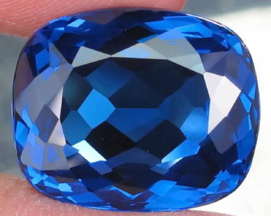 Natural London Blue Topaz 27.25 carats- VVS: Natural London Blue Topaz 27.25 carats- VVS.....Cushion Cut....Size 21x 18 x 10 mm ; 100% natural earth mined..irradiation treatment only.top luster fire; Top Color; Blue Topaz - reflects the energy o