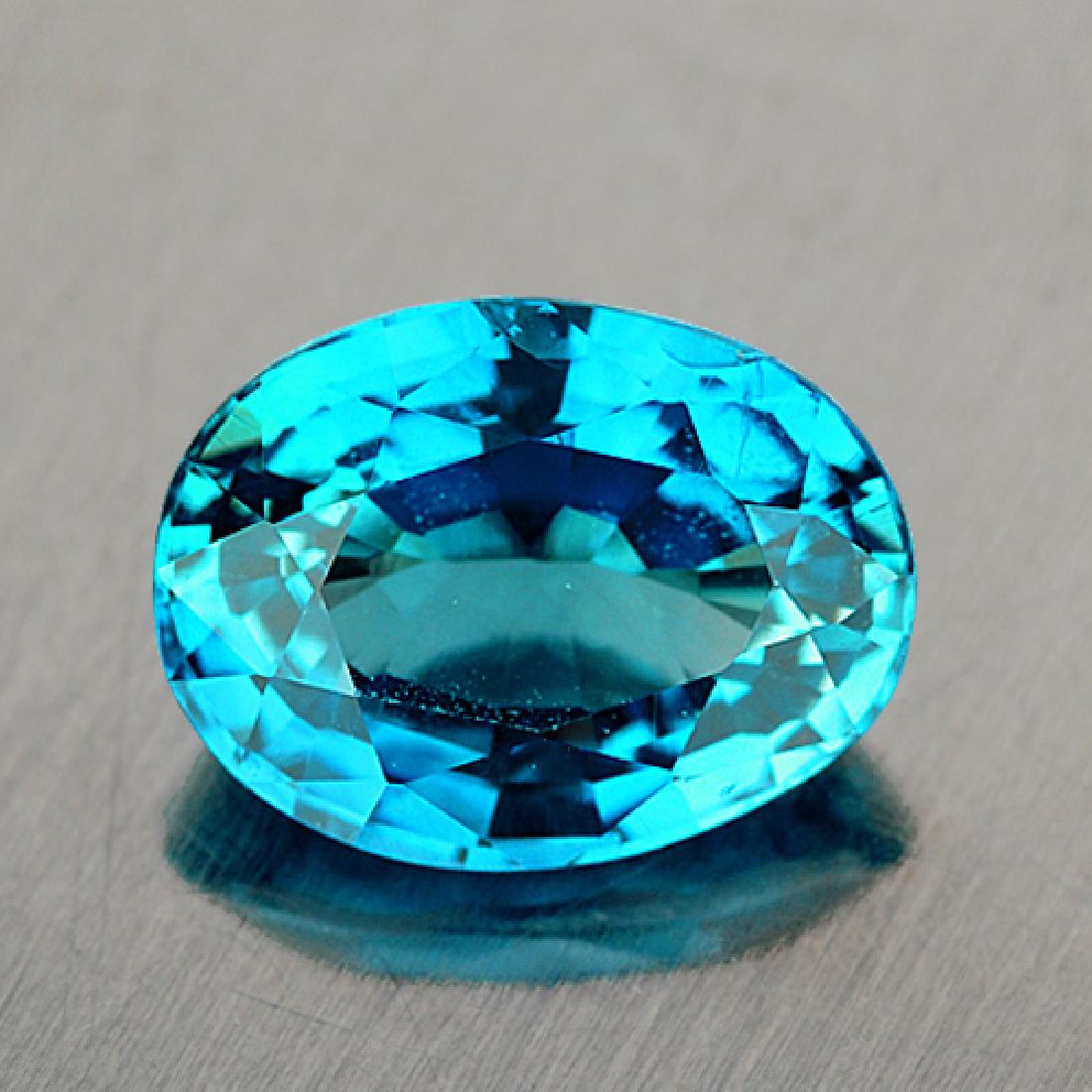 Natural Intense Blue Zircon 3.75 Cts {VVS}: Natural Blue Zircon; WEIGHT : 3.75 cts; SHAPE : Oval; SIZE ( L x W x D ) : 9.96 x 7.61 x 4.74 mm; QUANTITY : 1 pieces ; COLOR : Blue AAA COLOR; CLARITY : IF-VVS1 (BEST QUALITY) ORIGIN : Cambodia; HARD