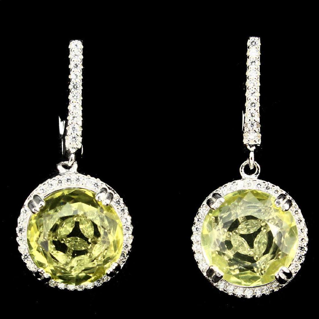 Natural Top Yellow Lemon Quartz Earrings: 925 STERLING SILVER;PLATE...14K WHITE GOLD;MAIN STONE...LEMON QUARTZ;OTHER GEMS...CUBIC ZIRCONIA;TOTAL WEIGHT...37.40 CT (TOTAL WEIGHT OF SILVER + STONE)DIMENSION* STONE 11.0 MM. * CZ 1.0 MM. * FACE E