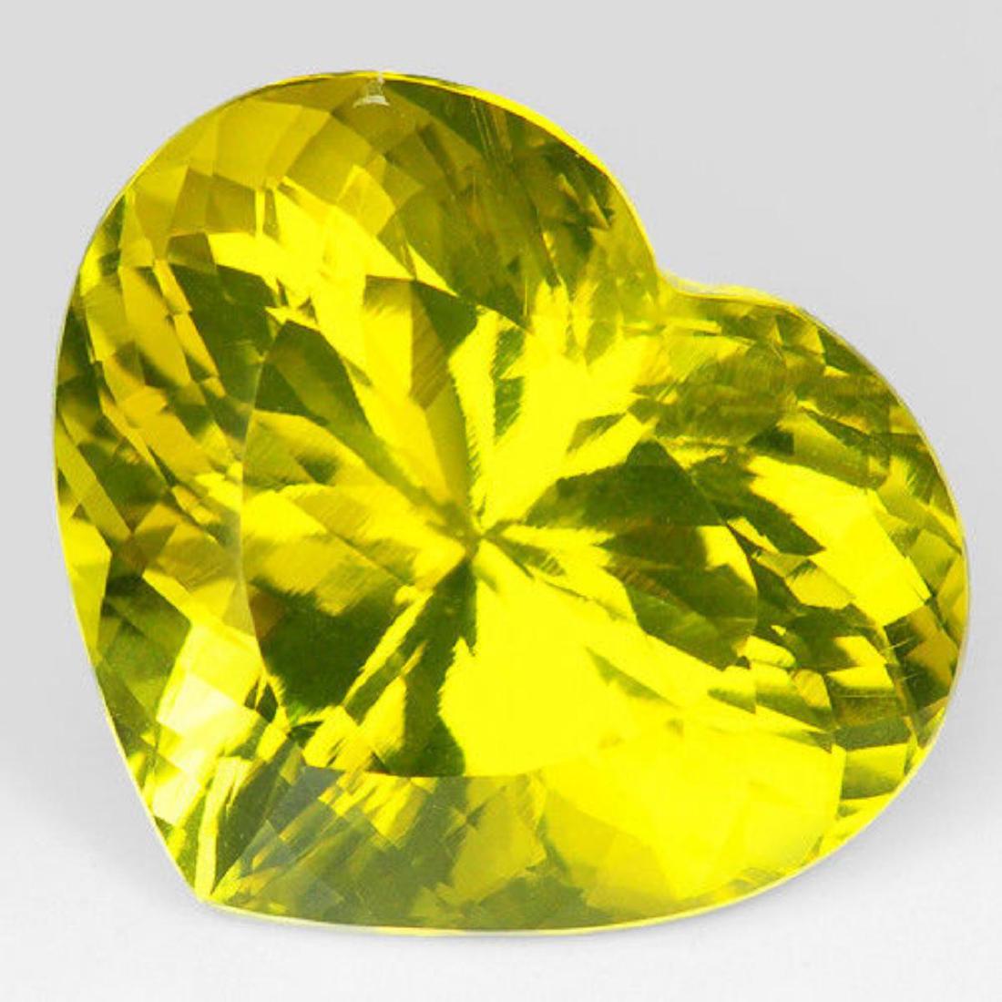 Natural Lemon Yellow Prasiolite Heart 61.25 Carats- VVS: Size :25.28 x 21.96 x 15.67 mmWeight :61.49 CtsColor :Lemon YellowShape :HeartOrigin :BrazilClarity :VVS Treatment :Unheated