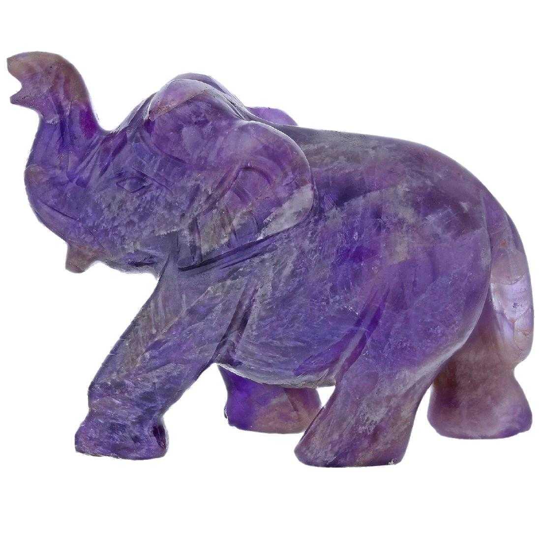 IMPRESSIVE 735 CT HAND CARVED AMETHYST ELEPHANT: IMPRESSIVE 735 CT NATURAL HAND CARVED 7 AMETHYST ELEPHANT.APPROXIMATELY 3" TALL AND 4 " IN LENGTH.By Many the Elephant is a symbol of beauty, power, dignity, intelligence and peace. The elephant is ge