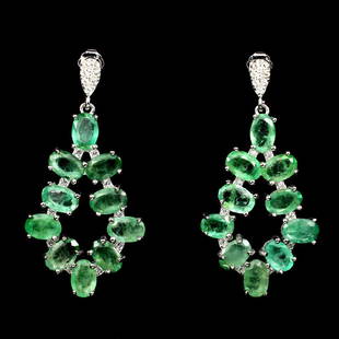 Natural Columbian Emerald 35 Carats Earrings: 925 STERLING SILVER; PLATE .....14K WHITE GOLD; MAIN STONE -EMERALD; OTHER GEMS CUBIC ZIRCONIA; TOTAL WEIGHT 35.01 CT (TOTAL WEIGHT OF SILVER + STONE) DIMENSION * STONE 6.0 X 4.0 MM. * CZ 1.0 MM. * FA