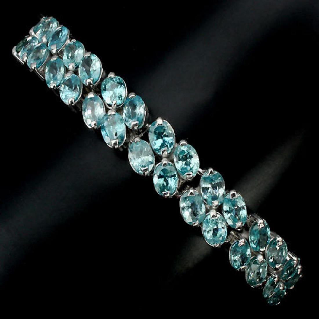 Nautral Combodian Zircon 146 Carats Bracelet: 925 STERLING SILVER.....14K WHITE GOLD Plated;LENGTH (INCHES)-7;MAIN STONE-ZIRCON;TOTAL WEIGHT-146.85 CT (TOTAL WEIGHT OF SILVER + STONE)DIMENSION* STONE 6.0 X 4.0 MM. * FACE BRACELET 170.0 X 10.0 MM.