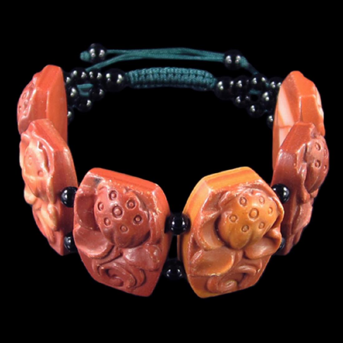 Natural Stone Hand Carved Meditation Lotus Bracelet: *Stone Name Red Malachite Lotus *Stone Overall Dimension for each bead 28x20x10 mm (1.102x0.787x0.394 inch ) *Weight 270 ct/ 54 g/ 1.904796 oz*Handcrafted knot chain;Other Stones used in this Bracelet