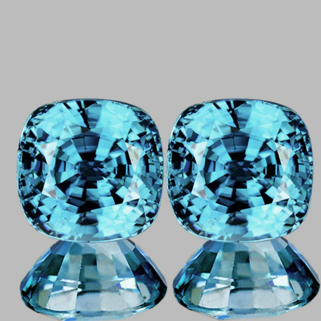 Natural AAA Seaform Blue Zircon {Flawless-VVS1}: Natural Blue Zircon WEIGHT : 3.21 -Cts; SHAPE : Cushion SIZE ( L x W x D ) : 5.70 mm QUANTITY : 2 pieces COLOR : Electric Blue AAA Color CLARITY : Flawless-VVS1 AAA Grade ORIGIN : Cambodia HARDNESS : 