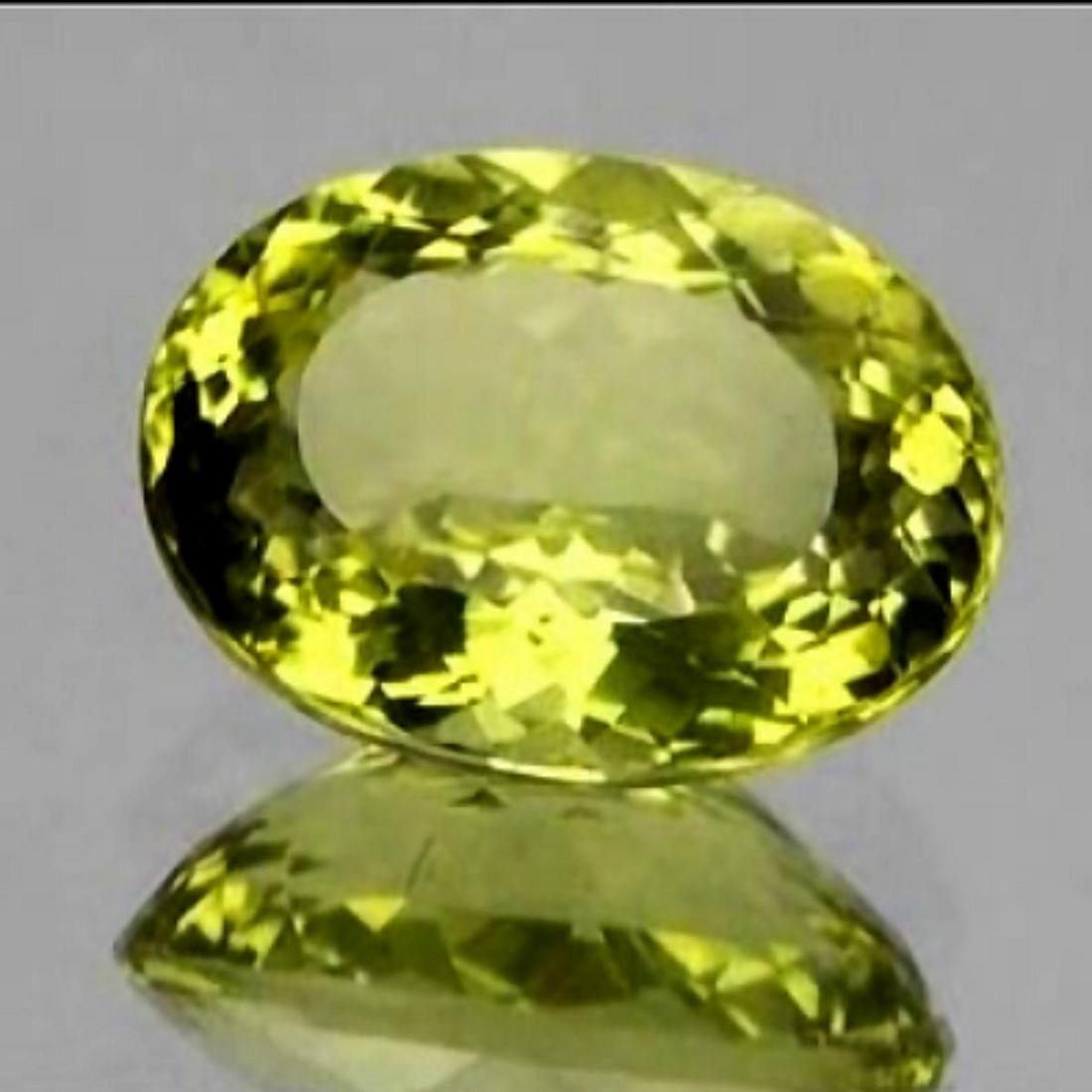 Natural Lemon Quartz 7.18 Cts - VVS: STONE NAME : Natural Lemon Quartz; WEIGHT : 7.18 cts; SHAPE : Oval; SIZE ( L x W x D ) : 15 x 11 x 7 mm; QUANTITY : 1 pieces; COLOR : Green Gold ; CLARITY : Flawless-VVS1; ORIGIN : Brazil; HARDNESS : 