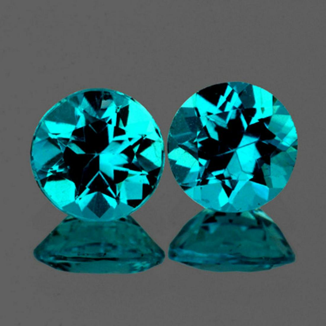 Natural Rare Brazil Blue Apatite Pair 6.50 MM - VVS: Natural Apatite.... WEIGHT : 2.06 cts; SHAPE : Round SIZE ( L x W x D ) : 6.50 mm; QUANTITY : 2 pieces (Perfectly Match Pair); COLOR : Paraiba Blue AAA Color; CLARITY : Flawless-VVS1; ORIGIN : Brazil;