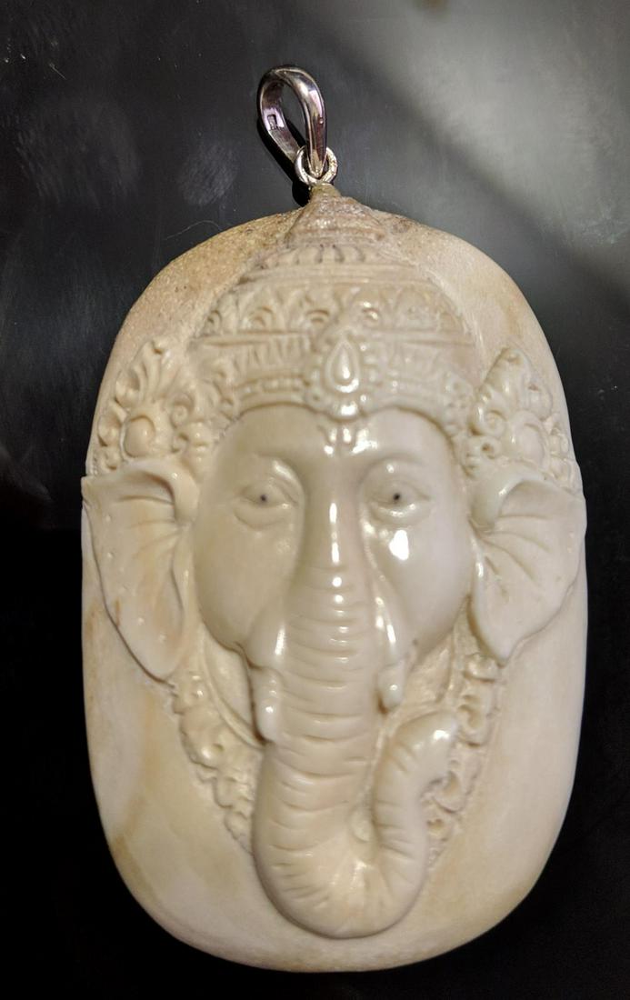 Hand Carved Antler Lord of Wisdom Pendant: Hand Carved Antler Lord of Wisdom Ganesha Pendant......material....Antler ....Size 60x38 MM
