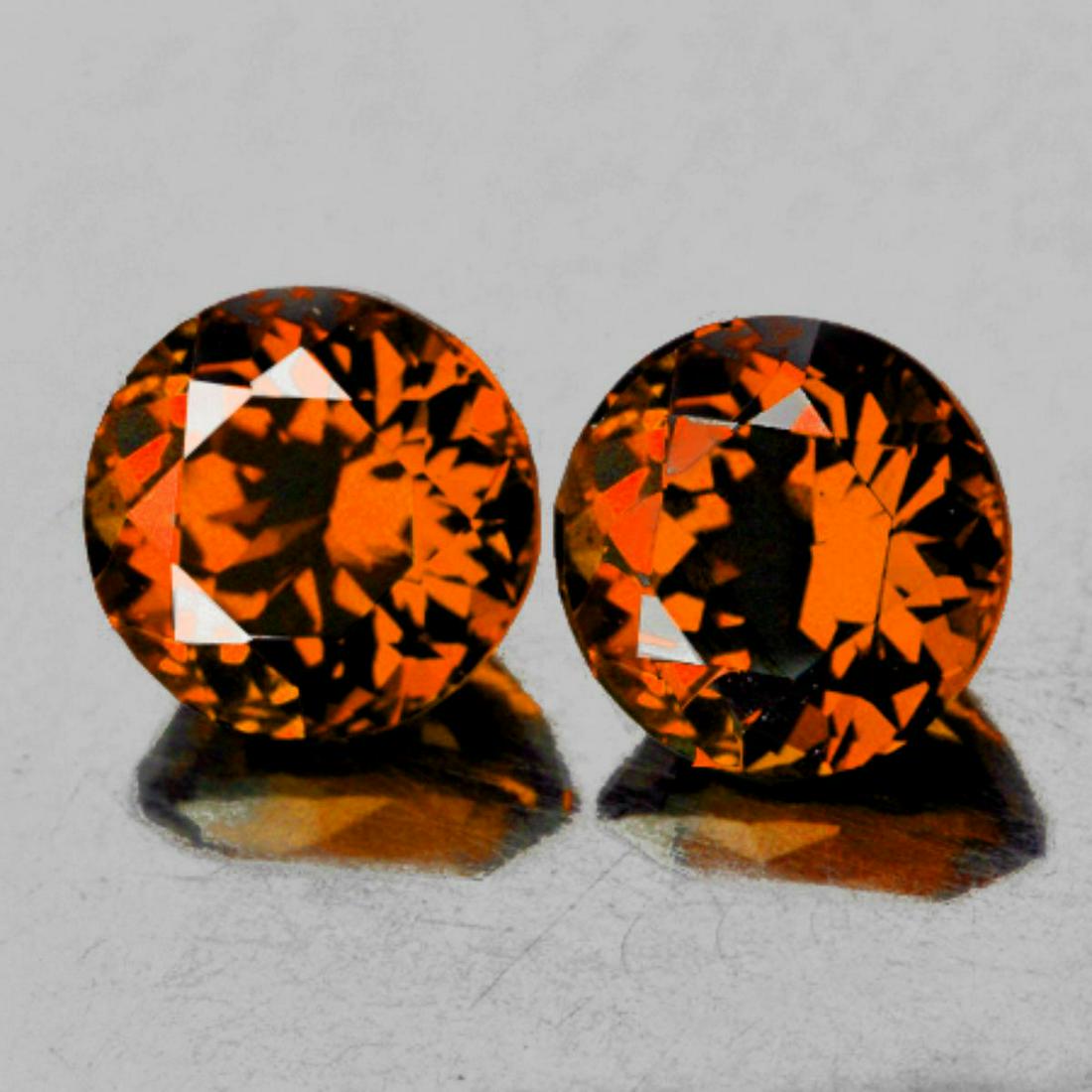 Natural Intense Orange Zircon Pair 4.50 MM - Flawless: Natural Zircon WEIGHT : 1.10 cts SHAPE : Round SIZE ( L x W x D ) : 4.50 mm QUANTITY : 2 pieces (Perfect Matching Set) COLOR : Intense Orange AAA Color CLARITY : FLAWLESS-VVS1 AAA Grade ORIGIN : Cambo