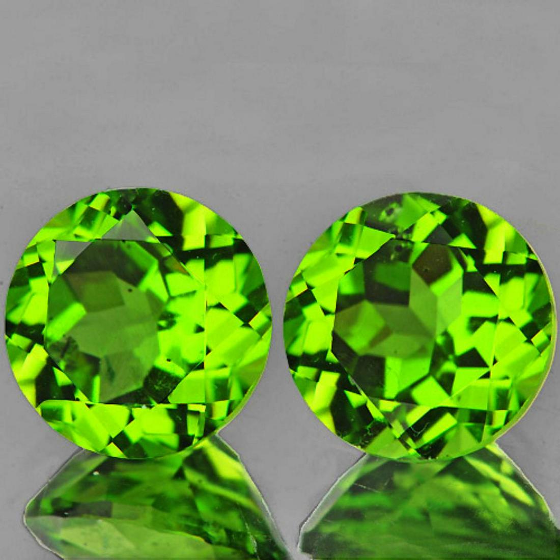 Natural Green Peridot Pair 7.00 MM - VVS: Natural Peridot ...... SHAPE : Round; SIZE ( L x W x D ) : 7.00 mm; QUANTITY : 2 pieces ( Perfectly Matched Pair ); COLOR : BEST AAA Green ; CLARITY : IF-VVS1 (BEST QUALITY); ORIGIN : PAKISTAN; HARDNE