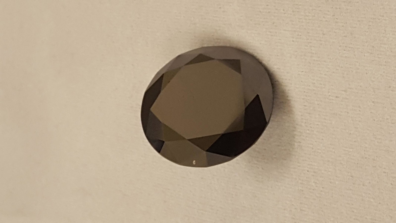 GORGEOUS RARE 18 CT BLACK DIAMOND MOISSANITE: GORGEOUS RARE 18 CT BLACK DIAMOND MOISSANITE .THIS INVESTMENT GRADE DIAMOND MOISSANITE HAS A DEEP SILKY TONE AND VIVID POLISH AND LUSTER. PHENOMENAL ROUND DIAMOND CUT. Diamonds vs. Moissanite, a side 