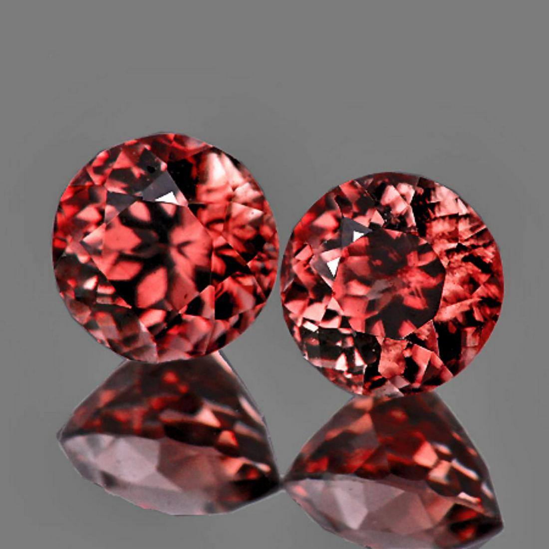 Natural Pinkish Orange Zircon Pair 4.50 MM - VVS: Natural Zircon Pair; ....... SHAPE : Round SIZE ( L x W x D ) : 4.50 mm QUANTITY : 2 pieces (Perfect Matching Pair) COLOR : Pinkish Orange AAA Color CLARITY : FLAWLESS-VVS1 AAA Grade ORIGIN : Cambodia