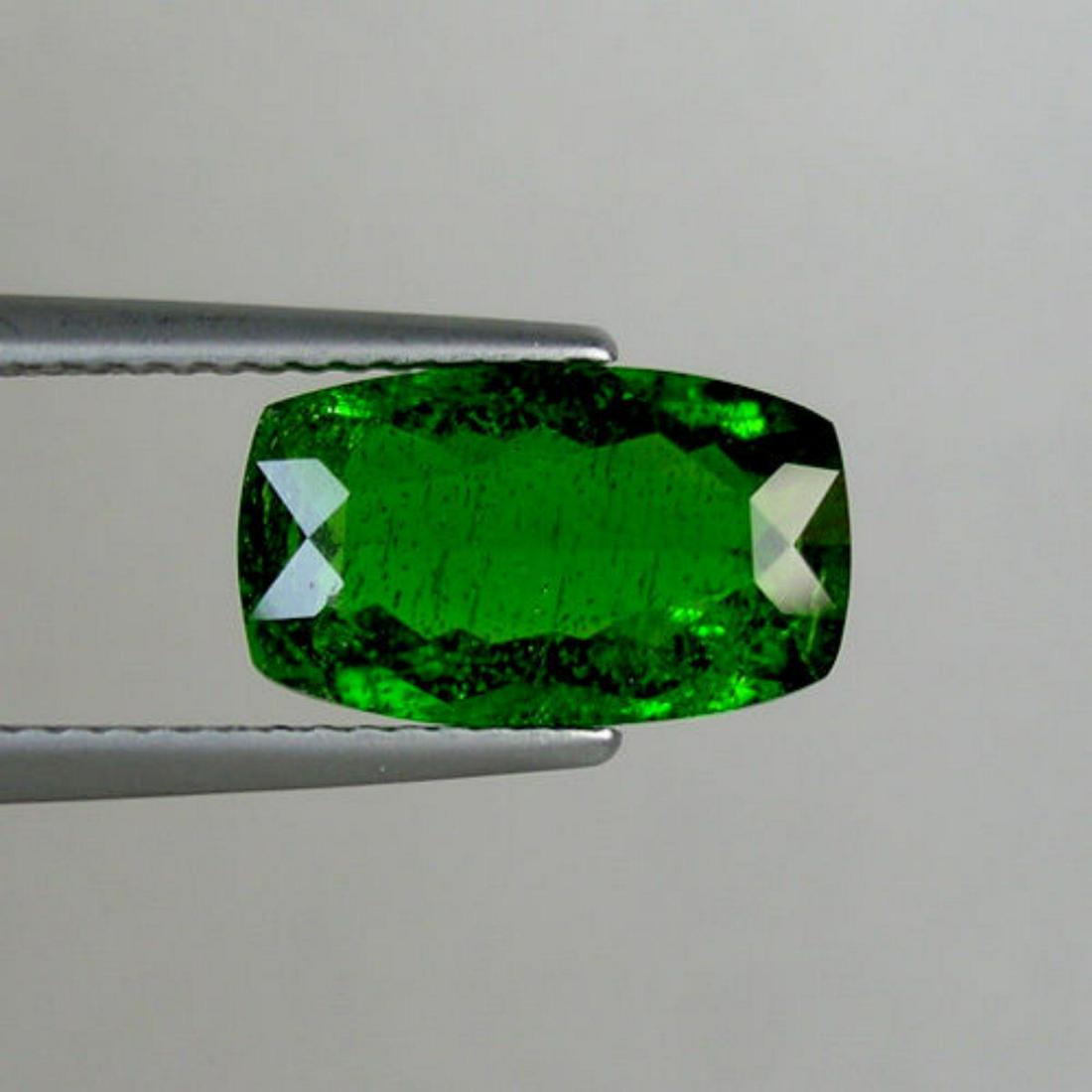 Natural Chrome Diopside 2.94 carats: Natural Chrome Diopside..............Dimension:-12.05 x 7.15 Depth 3.86 MM;Color :-Green As Picture;Weight:-2.94 Carats.;Shape/Cut:-Long Cushion;Origin:-Russia