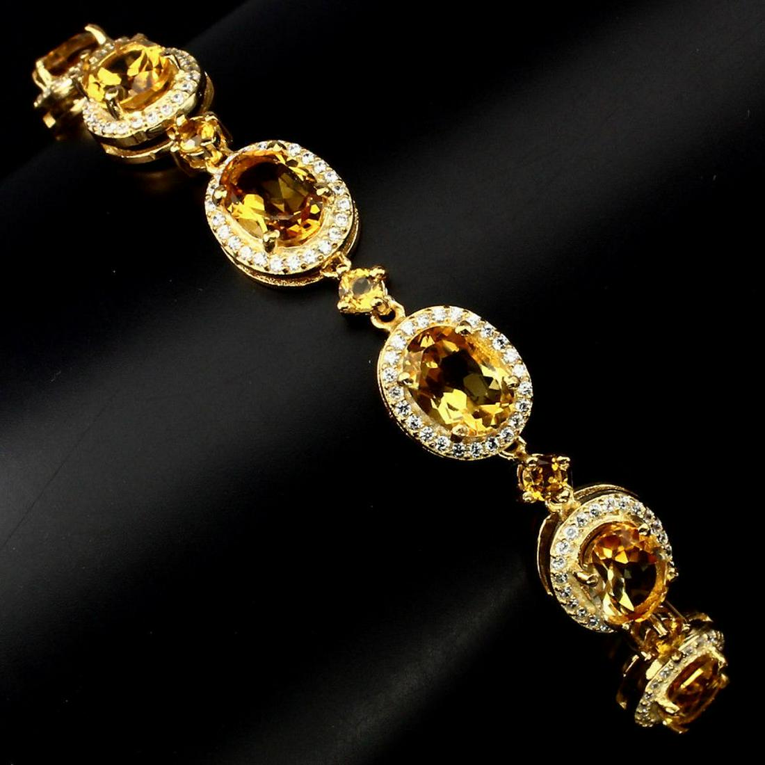 Natural 8x6mm Top Rich Yellow Citrine Bracelet: 925 STERLING SILVER;PLATE....14K YELLOW GOLD;LENGTH (INCHES)8;MAIN STONECITRINEOTHER GEMSCUBIC ZIRCONIATOTAL WEIGHT60 CT (TOTAL WEIGHT OF SILVER + STONE)DIMENSION* STONE 3.0 TO 8.0 X 6.0 MM. * CZ 1.0 