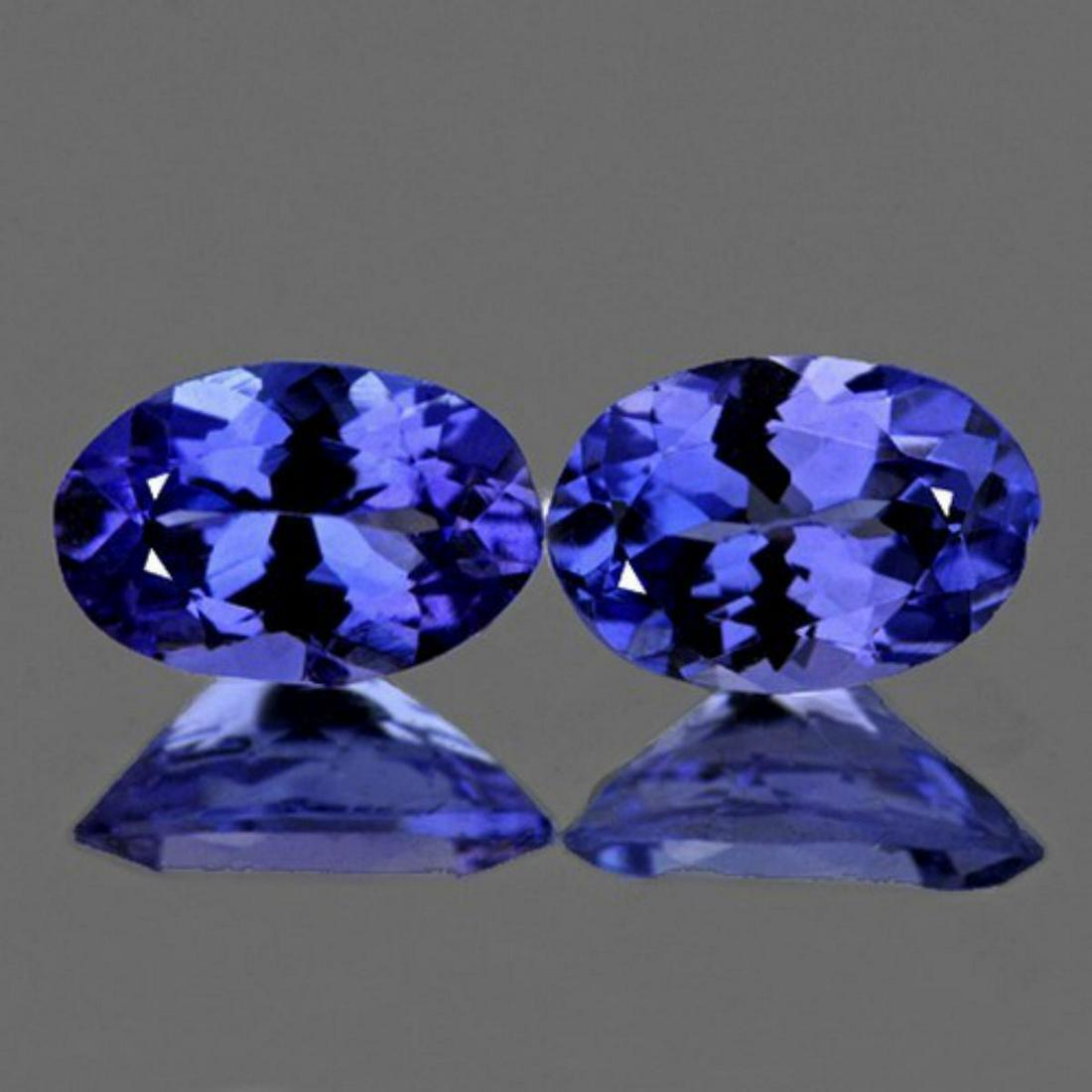 Natural Purple/Blue Tanzanite 6x4 mm - AAA: Natural Purple/Blue Tanzanite 6x4 mm - AAA...... SHAPE : Oval SIZE ( L x W x D ) : 6.00 x 4.00 mm QUANTITY : 2 pieces ( Perfectly Matched Pair ) COLOR : Intense Purple Blue AAA COLOR CLARITY : IF-VVS1