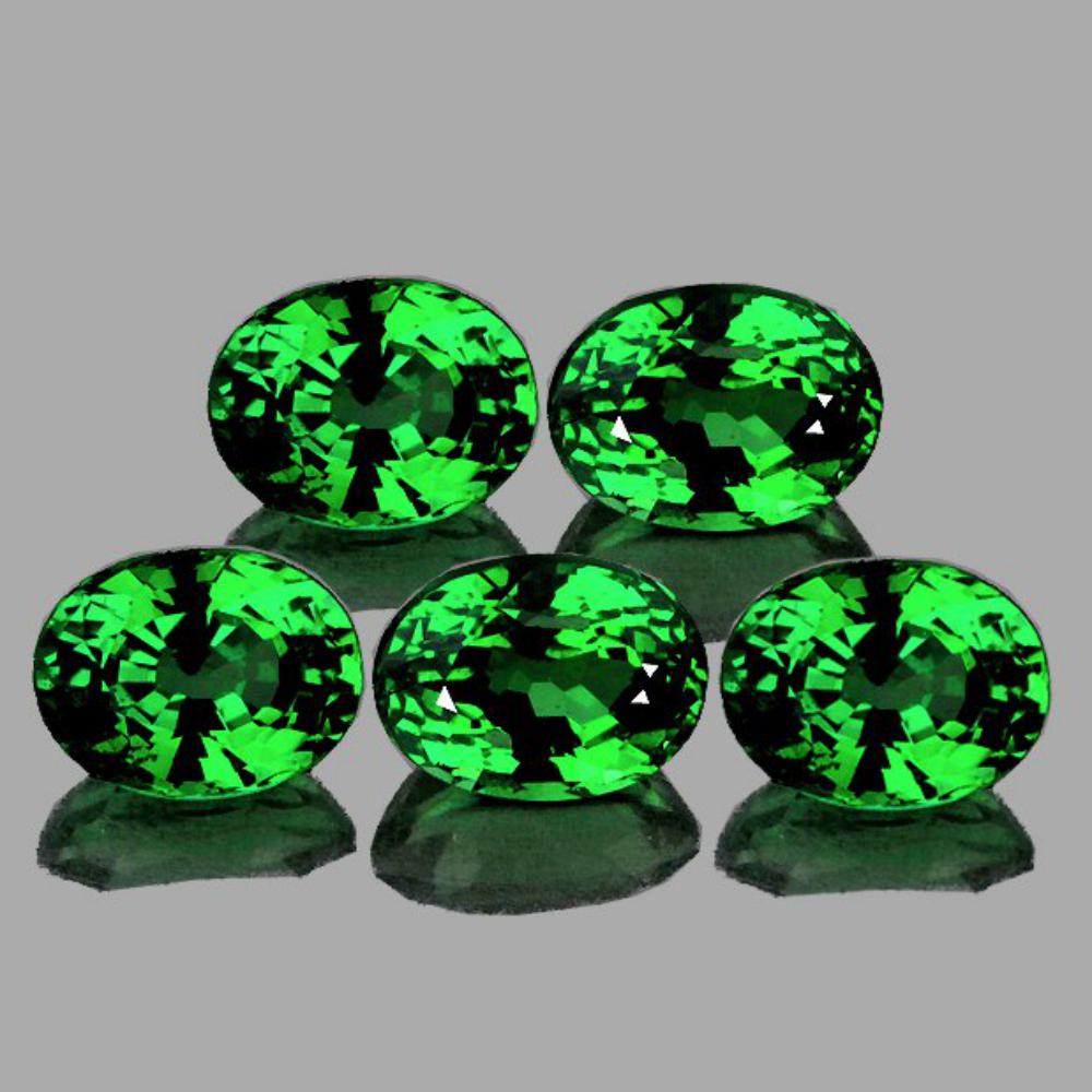 Natural Emerald Green Tsavorite Garnet 5 Pcs {VVS}: Natural Green Garnet (Tsavorite) WEIGHT : 1.36 cts; SHAPE : Oval SIZE ( L x W x D ) : 4.50 x 3.50 mm; QUANTITY : 5 pieces; COLOR : Emerald Green; CLARITY : VVS; ORIGIN : Africa; HARDNESS : 7; LUSTER :