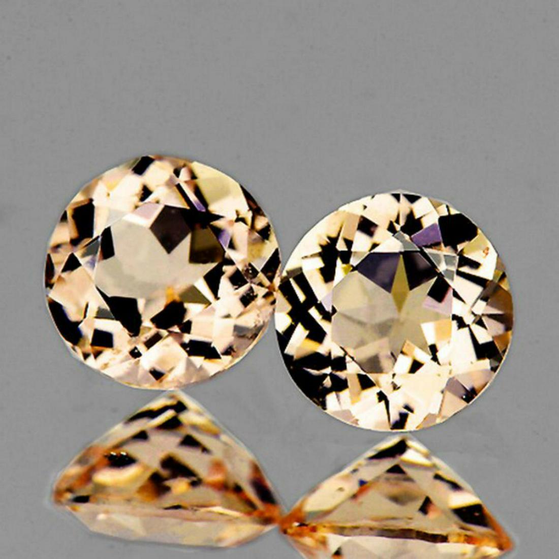 Natural Soft Golden Pink Morganite Pair [Flawless-VVS]: Natural Morganite Pair;SIZE ( L x W x D ) : 7.00 mm;COLOR : Soft Golden Pink;SHAPE : Round;QUANTITY : 2 pieces;LUSTER : Excellent!CLARITY : Flawless - VVS;HARDNESS : 8;ORIGIN : Brazil; TREATMENT : 100