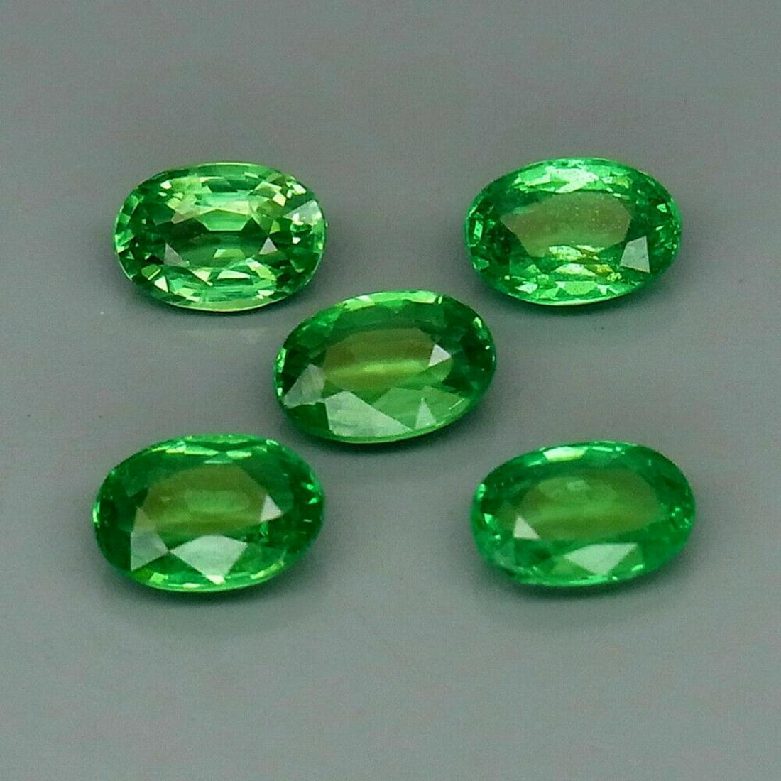 Natural Top Green Tsavorite Garnet 5Pcs/2.30Ct: Tsavorite Garnet SHAPE Oval WEIGHT 2.30 Ct.SIZE 6 X 4 mm QUANTITY 5 PiecesCOLORTop GreenCLARITYVS & SI LUSTER Superior ORIGIN Tanzania TREATMENT None HARDNESS 7-7.5