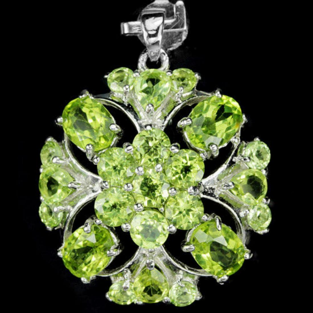NATUARL APPLE GREEN PERIDOT FLOWER PENDANT: NATUARL APPLE GREEN PERIDOT 925 SILVER FLOWER PENDANT 14K WHITE GOLD COATING; STONE SHAPEMIXED SHAPESTONE DIMENSION7 X 5 MM. , 5 X 4 MM. , 4 MM. & 3 MM.ITEM WEIGHT5 GRAMCOLORAPPLE GREENCLARITYIF - VVS