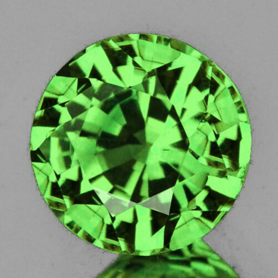 Natural Green Tsavorite Garnet {Flawless-VVS}: Natural Green Garnet (Tsavorite) SHAPE : Round; SIZE ( L x W x D ) : 3.80 x 2.26 mm; QUANTITY : 1 piece; COLOR : Tsavorite Green; CLARITY : Flawless-VVS AAA Grade; ORIGIN : Tanzania; HARDNESS : 7; LUS