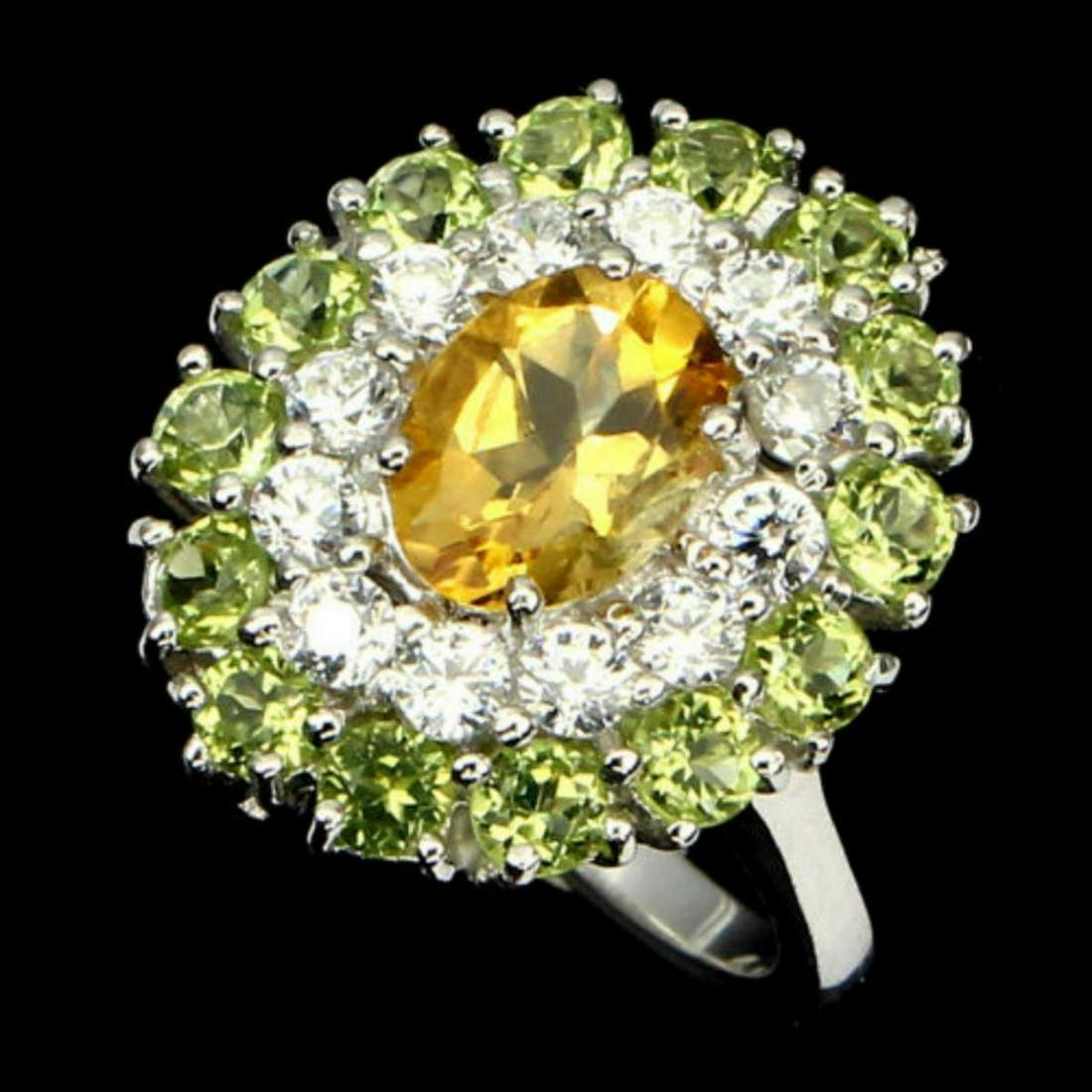 Natural Citrine Peridot 25 Carats Ring: 925 STERLING SILVER..........PLATE-14K WHITE GOLD;RING SIZE-7.5;MAIN STONE-CITRINE;OTHER GEMS-CUBIC ZIRCONIA,PERIDOT;TOTAL WEIGHT25.31 CT (TOTAL WEIGHT OF SILVER + STONE)DIMENSIONSTONE 3.0 TO 8.0 X 6.