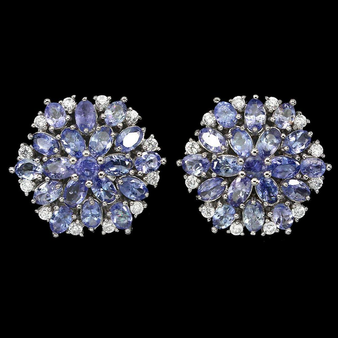 Natural Unheated Oval Tanzanite Earrings: 925 STERLING SILVER;PLATE-14K WHITE GOLD;MAIN STONE-TANZANITE;TOTAL WEIGHT-7.67 GRAM (TOTAL WEIGHT OF SILVER + STONE)DIMENSION--* STONE 3.5 TO 5.0 X 3.0 MM. * CZ 2.0 MM. * FACE EARRINGS- 21.0 X 21.0 M