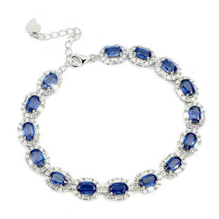 Natural Unheated Oval Kyanite Bracelet: 925 STERLING SILVER;PLATE-14K WHITE GOLD;LENGTH (INCHES)7;MAIN STONE-KYANITE;TOTAL WEIGHT-12.06 GRAM (TOTAL WEIGHT OF SILVER + STONE)DIMENSION-* STONE 6.0 X 4.0 MM. * CZ 1.5 TO 3.0 X 1.5 MM. * TOTAL