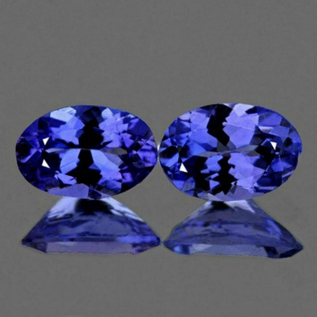Natural Purple/Blue Tanzanite 6x4 mm - AAA: Natural Purple/Blue Tanzanite 6x4 mm - AAA...... SHAPE : Oval SIZE ( L x W x D ) : 6.00 x 4.00 mm QUANTITY : 2 pieces ( Perfectly Matched Pair ) COLOR : Intense Purple Blue AAA COLOR CLARITY : IF-VVS1