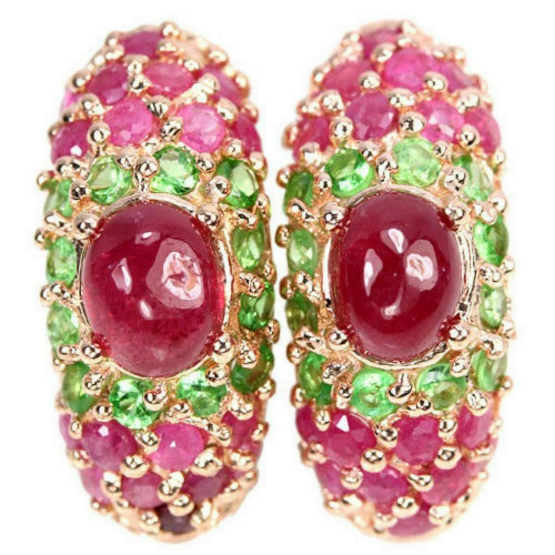 Natural RED RUBY OVAL & GREEN TSAVORITE GARNET Earrings: GENUINE RED RUBY OVAL & TSAVORITE GARNET 925 SILVER EARING 14K PINK GOLD COATING;STONE SHAPEOVAL CABOCHON CUTSTONE DIMENSION7 X 5 MM.ITEM WEIGHT6.4 GRAMCOLORREDCLARITYTRANSLUCENTLUSTERALLURINGTREATMEN