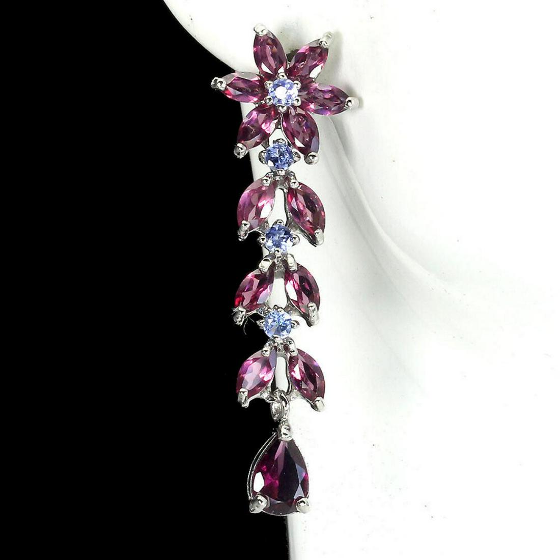 Natural Rhodolite Garnet Tanzanite Earrings: 925 STERLING SILVER;PLATE-14K WHITE GOLD;MAIN STONE-RHODOLITE GARNET;OTHER GEMS-TANZANITE;TOTAL WEIGHT-7.91 GRAM (TOTAL WEIGHT OF SILVER + STONE);DIMENSION-* STONE 2.5 TO 7.0 X 5.0 MM.* FACE EARRINGS 