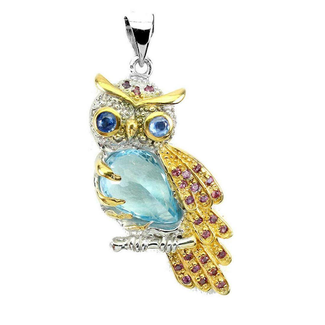 Handcrafted Topaz & Tanzanite Pendant: 925 STERLING SILVER;PLATE-2-TONE WHITE & YELLOW 14K GOLD;MAIN STONE- TOPAZ;OTHER GEMS-RHODOLITE GARNET, TANZANITE;TOTAL WEIGHT-10.64 GRAM (TOTAL WEIGHT OF SILVER + STONE);DIMENSION-* STONE 1.5 TO 16.0