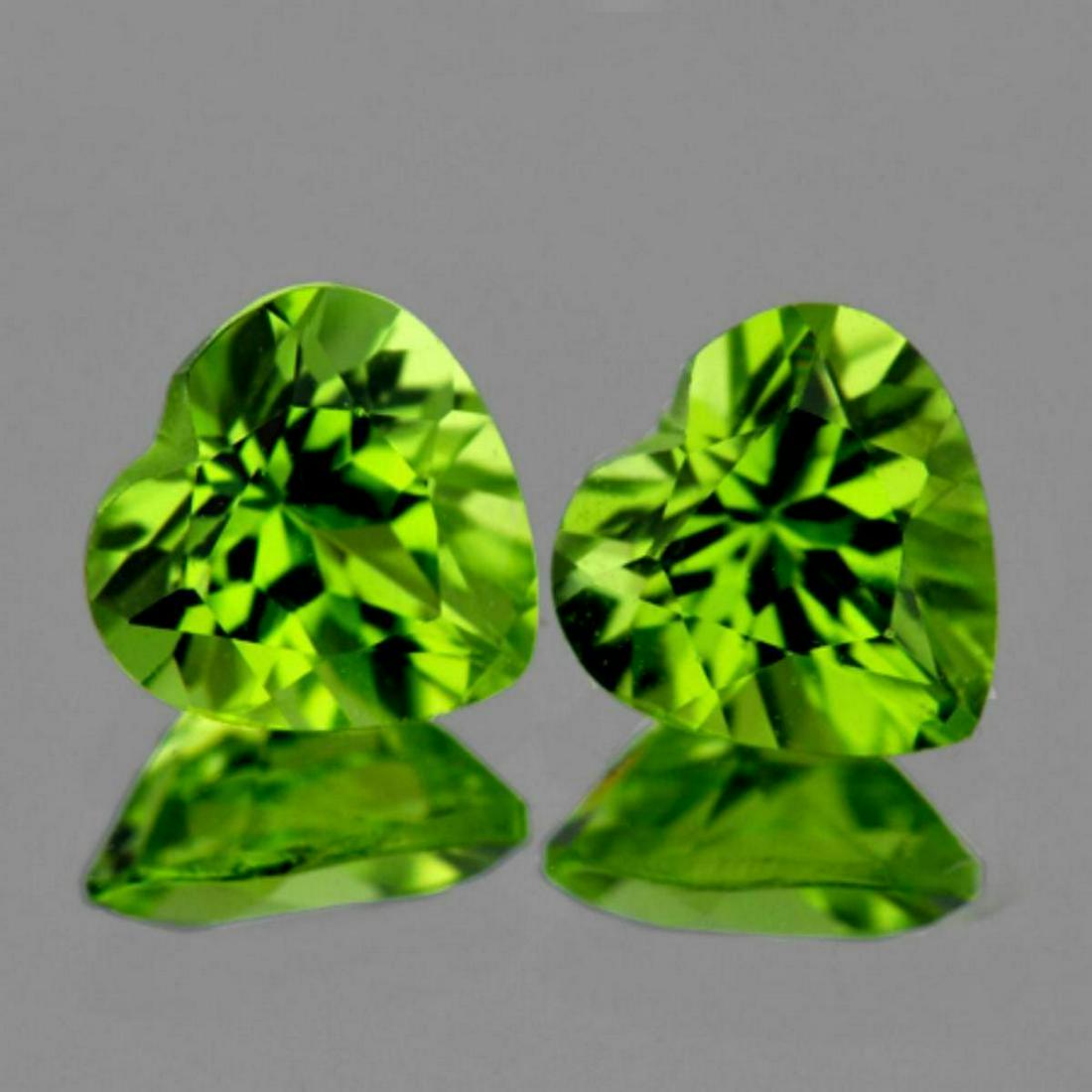 Natural Green Peridot Heart Pair 7 mm - VVS: Natural Green Peridot Heart Pair 7 mm - VVS...QUANTITY : 2 pieces ( Perfectly Matched Pair ) COLOR : Top Neon Green ; CLARITY : IF-VVS1 (BEST QUALITY) ORIGIN : PAKISTAN; HARDNESS : 7; LUSTER : Excelle