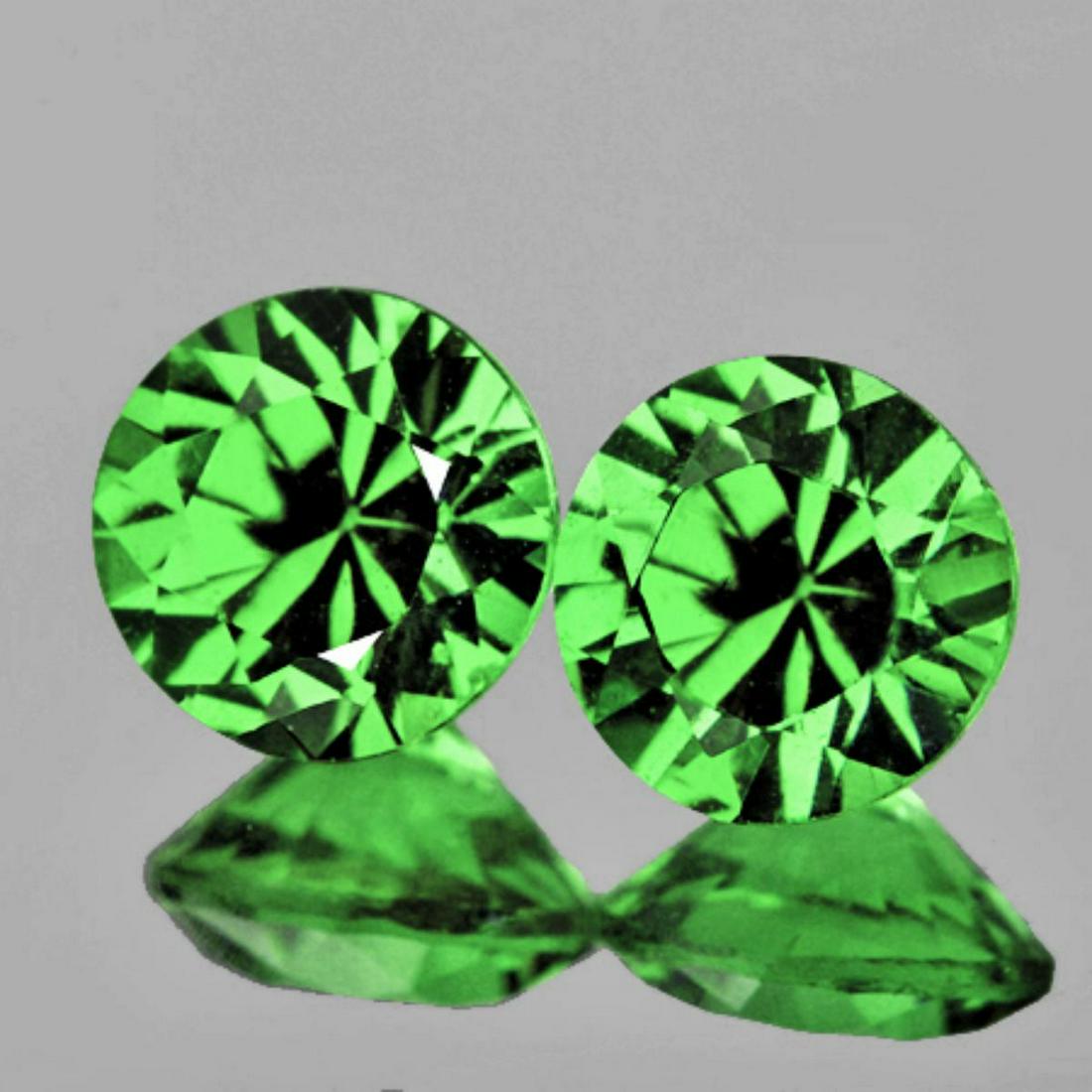 Natural Chrome Green Tsavorite Garnet Pair (Flawless-VVS): Natural Green Garnet (Tsavorite) WEIGHT : 0.54 cts; SHAPE : Round (Diamond Cut) SIZE ( L x W x D ) : 4.20 mm; QUANTITY : 2 pieces ( Perfectly Matched Pair) COLOR : Chrome Green ; CLARITY : Flawless-VV