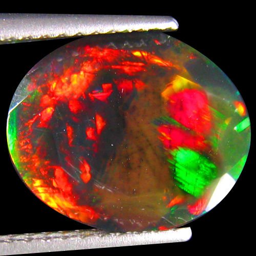 Natural Multi Color Welo Black Opal 2.54 Carats: RAINBOW MULTI FLASHINGShape:OVALWeight:2.54 CtsSize:(LxWxH)12.75 x 10.20 x 4.97 mmHardness:6.5 MOH'S SCALEOrigin:WELO-ETHIOPIA