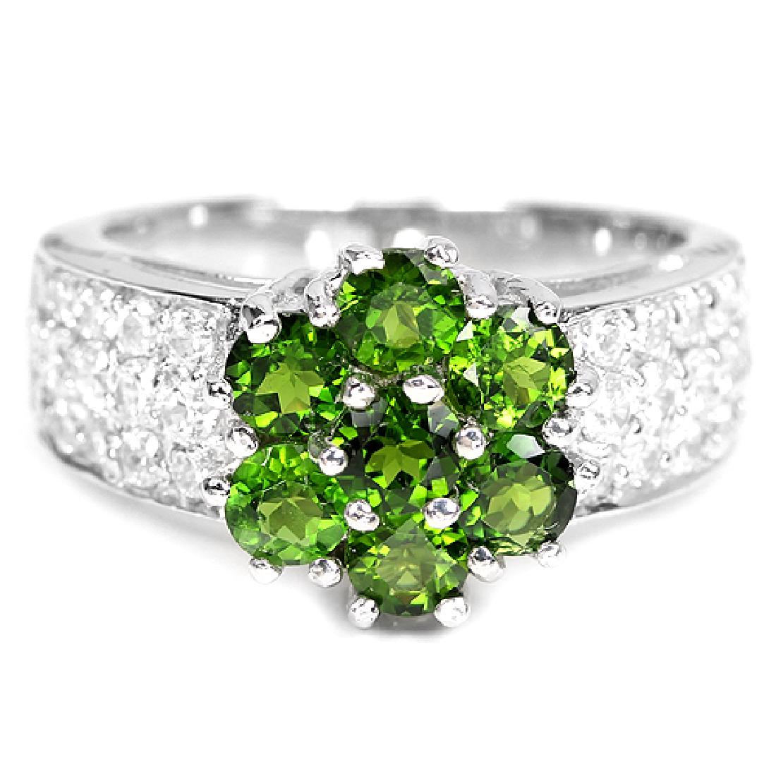 Natural Green Diopside Ring: NATURAL GREEN CHROME DIOPSIDE & WHITE CZ 925 SILVER RING 14K WHITE GOLD COATING; size 6.25; STONE SHAPEROUNDSTONE DIMENSION3.5 MM.ITEM WEIGHT4.44 GRAMCOLORGREENCLARITYIF TO VVSLUSTERIMPRESSIVETREATMEN