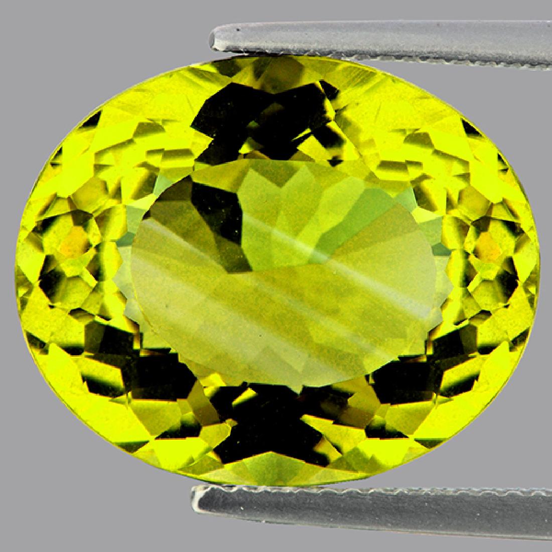 Natural Green Gold Lemon Quartz 14.01 cts - VVS: Natural Lemon Quartz.... WEIGHT : 14.01 cts; SHAPE : Oval SIZE ( L x W x D ) : 18.10 x 15.00 x 9.17 mm; QUANTITY : 1 pieces; COLOR : Green Gold; CLARITY : {Flawless-VVS1}; ORIGIN : Brazil... HARDNESS 