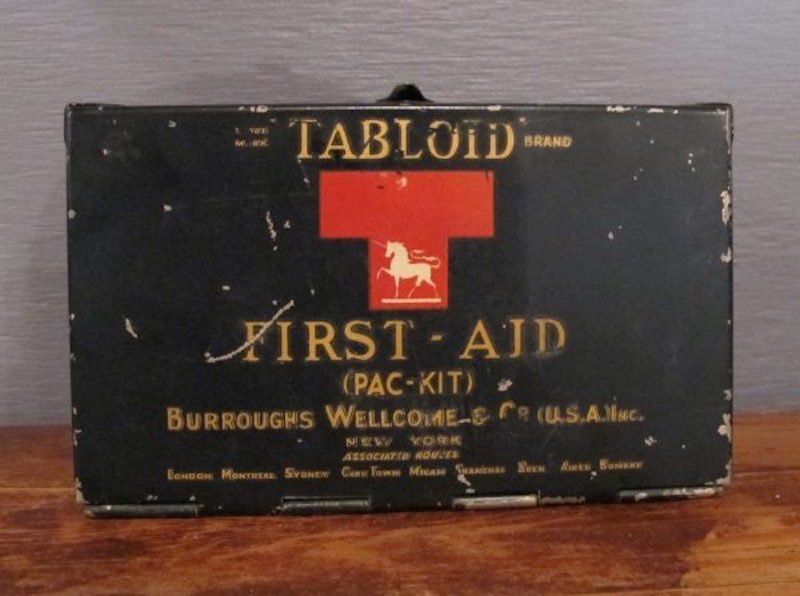 50. 20s-30s Tabloid First-Aid (Pac-Kit): The "Tabloid" brand first aid kits were made by Burroughs, Wellcome & Co. They were given to explorers and influential individuals of the day in an attempt to promote the product. In 1919, the first a