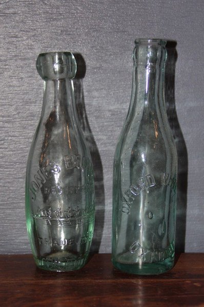 251. Lot of 2 English Spirit Bottles: "Oxford Wine Co." "Jones Brothers" Registered Trademark Blob Top