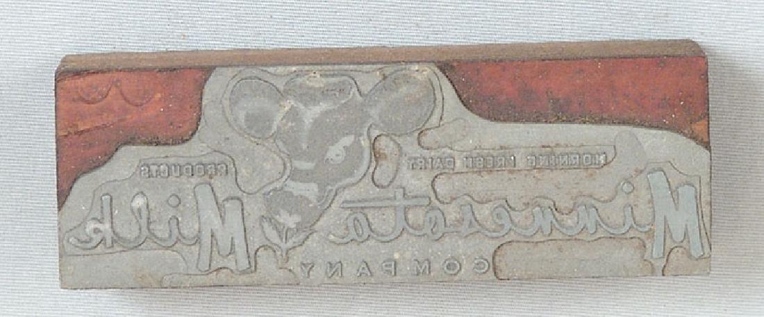 Old Wood Block Stamp - Minnesota Milk Company: This is a vintage wood block stamp. Age unknown, but most likely from sometime between the 1920s and 1950s. The second photo shows the image the stamp would produce when used. Approx. 3" x 1".