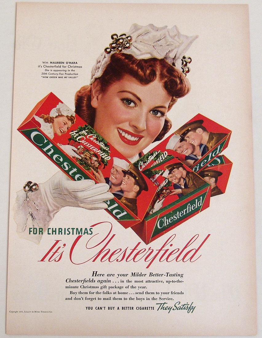 Antique 1941 Chesterfield Cigarette Advertisement: This is a vintage 1941 Christmas advertisement for Chesterfield cigarettes, taken from a vintage magazine. Features actress Maureen O'Hara. 10 1/4" x 14".