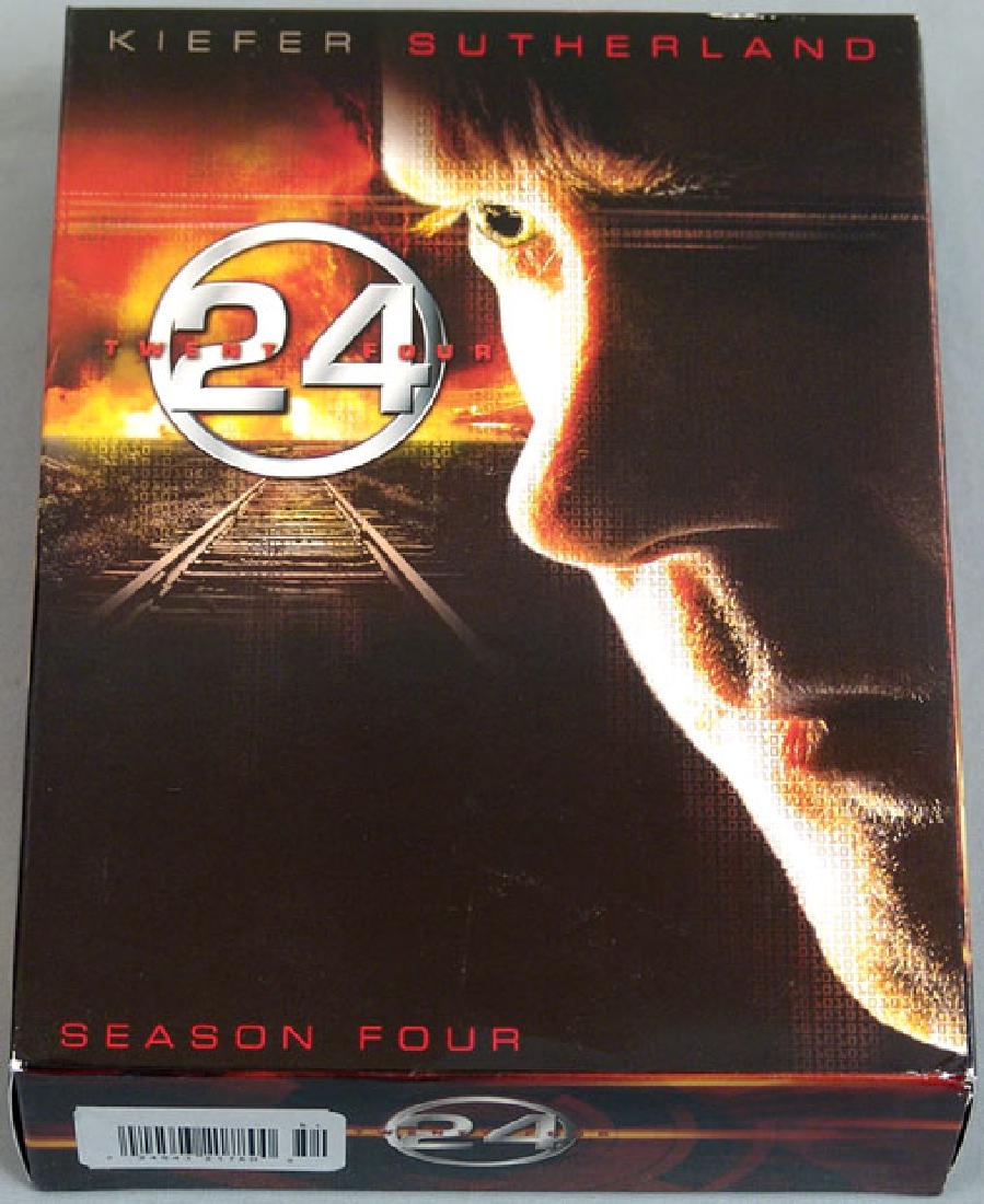 DVD Boxed Set - TV Series "24" - Season Four: This is a DVD boxed set of the complete fourth season of the Fox series "24," created by Joel Surnow and Robert Cochran and starring Kiefer Sutherland, Carlos Bernard, Kim Raver, and William Devane. O