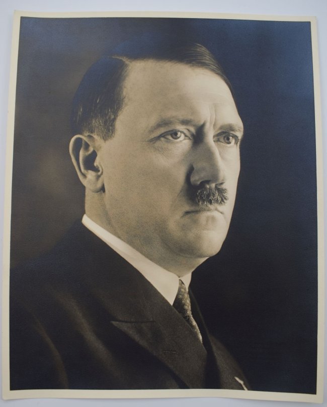 WWII THIRD REICH HEINRICH HOFFMAN HITLER PHOTOGRAPHY: World War II original silver gelatine Photography by Heinrich Hoffmann around 1943. Portrait of Adolf Hitler, on the back studio stamp Heinrich Hoffmann. Height: 30 x 24 cm. Heinrich Hoffmann was a Ge