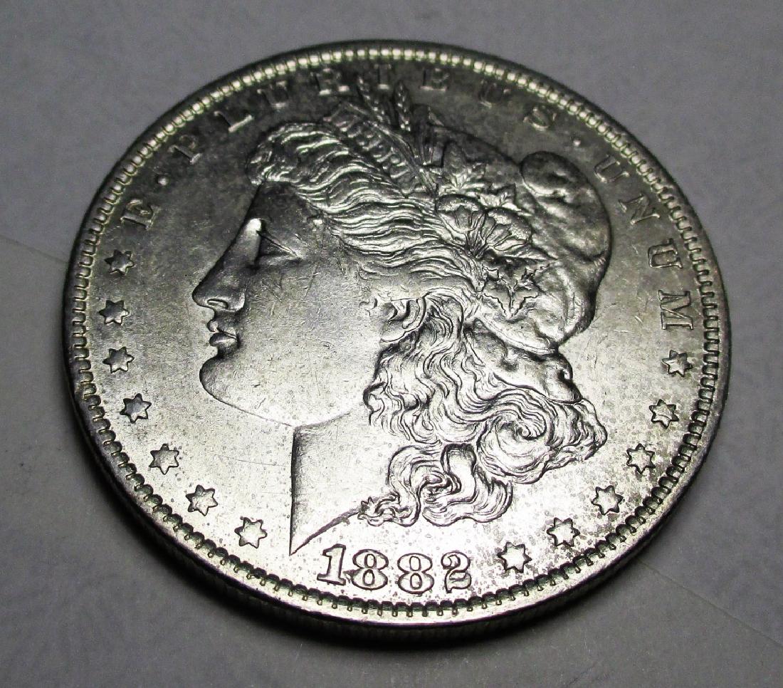 1882 O Tougher Date Morgan Silver dollar (1 of 2)